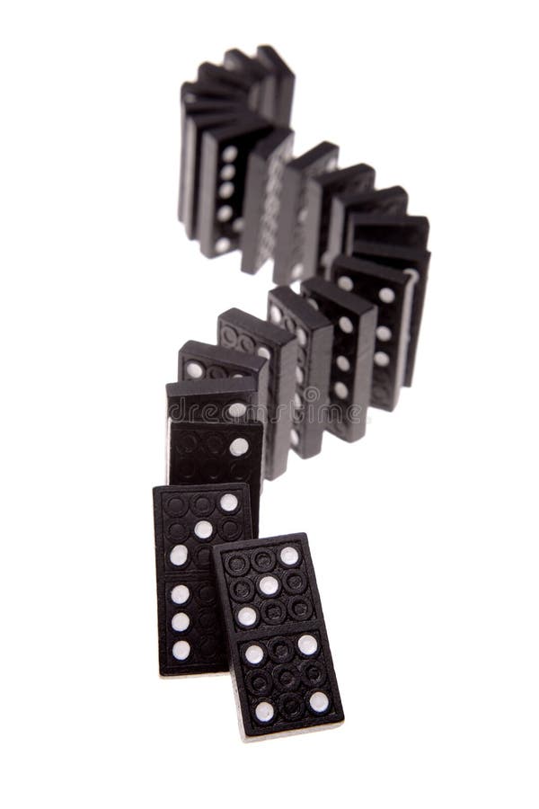 Row of dominoes falling on white