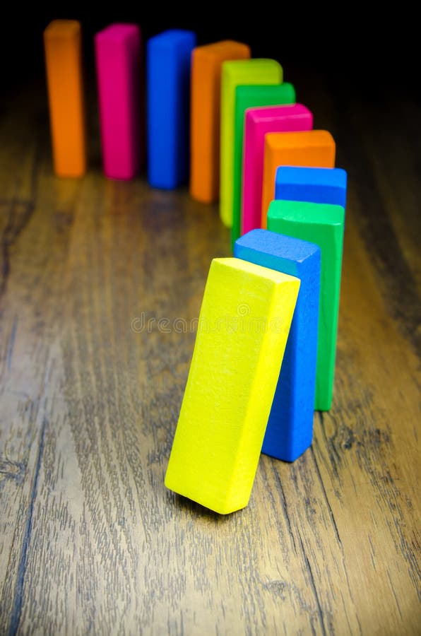 The domino effect of colorful wooden blocks