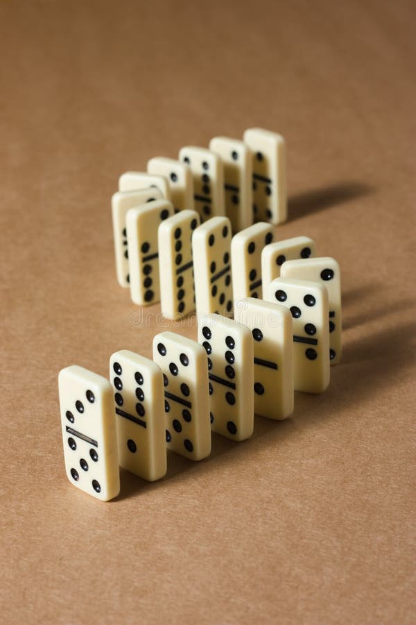 Dominoes on brown background