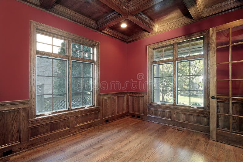 Library in new construction home with red walls. Library in new construction home with red walls