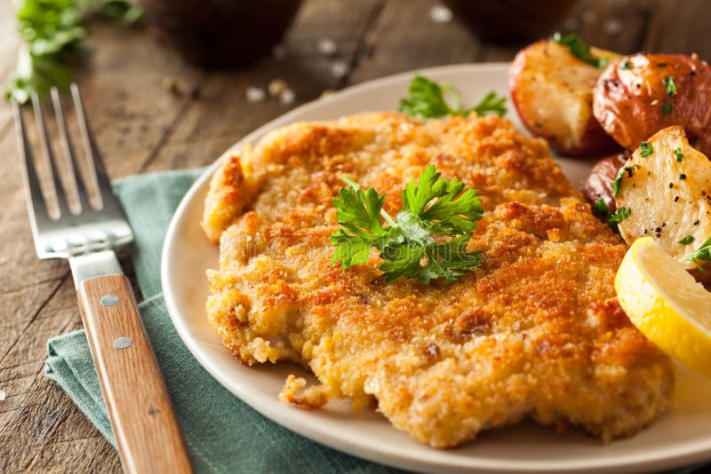 Domowej roboty Breaded niemiec Weiner Schnitzel obrazy stock Domowej roboty Breaded niemiec Weiner Schnitzel obrazy stock