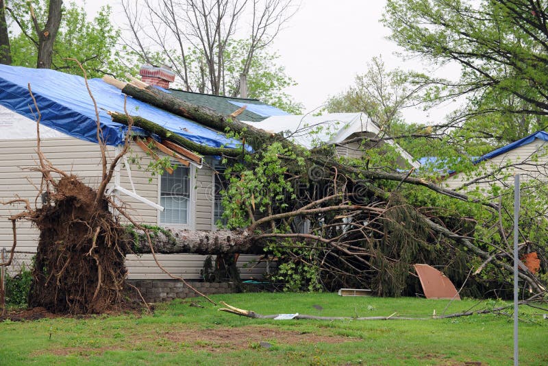 SAINT LOUIS, MISSOURI - APRIL 23: Damaged homes show tarp-covered roofs after tornadoes hit the Maryland Heights area on Friday April 22, 2011. SAINT LOUIS, MISSOURI - APRIL 23: Damaged homes show tarp-covered roofs after tornadoes hit the Maryland Heights area on Friday April 22, 2011