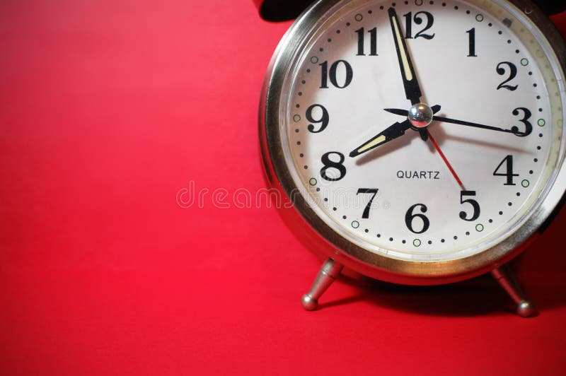 Flat lay shot of an alarm clock. Flat lay shot of an alarm clock.