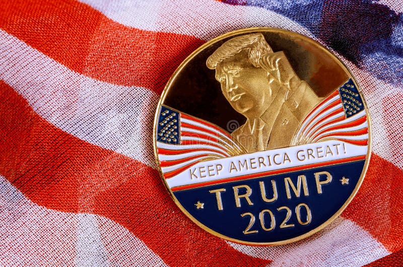 Donald Trump coin presidential against US flag in the election 2020. New York NY NOV 12 2019: Donald Trump coin presidential against US flag in the election 2020 royalty free stock photography Donald Trump coin presidential against US flag in the election 2020. New York NY NOV 12 2019: Donald Trump coin presidential against US flag in the election 2020 royalty free stock photography