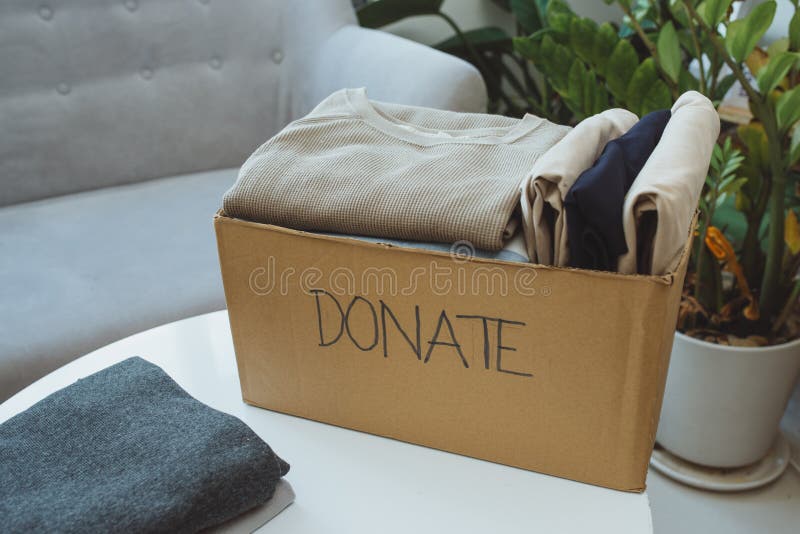 Donation Box and Casual Clothes in Livingroom Stock Image Image of