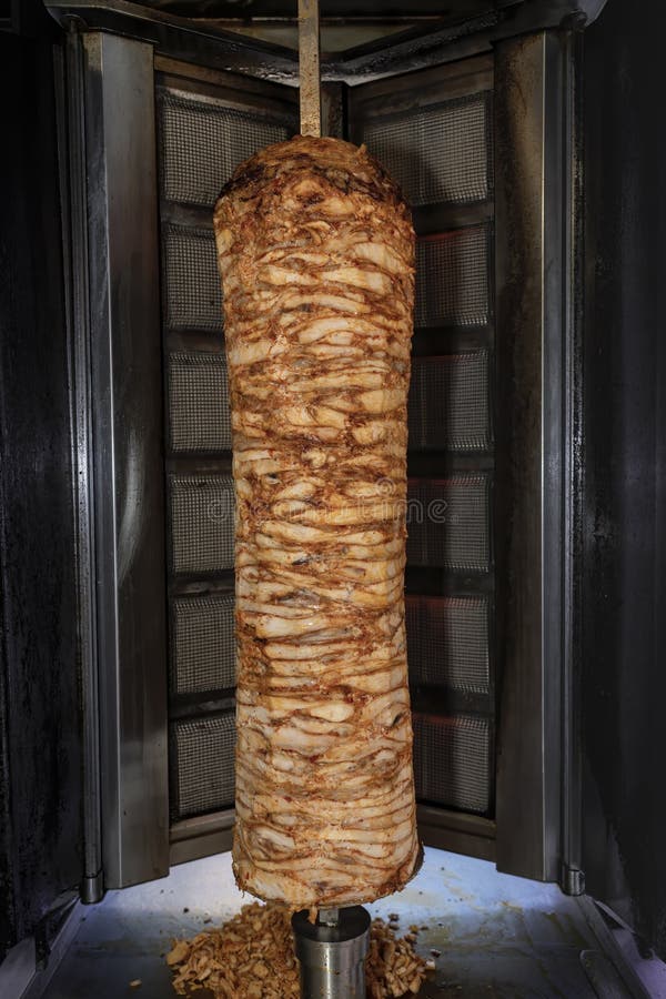 Doner Kebab Popular Fast Food Cooked on a Vertical Rotisserie Stock