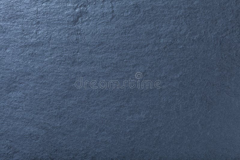 Donkerblauwe achtergrond van natuurlijke lei Textuur van steen