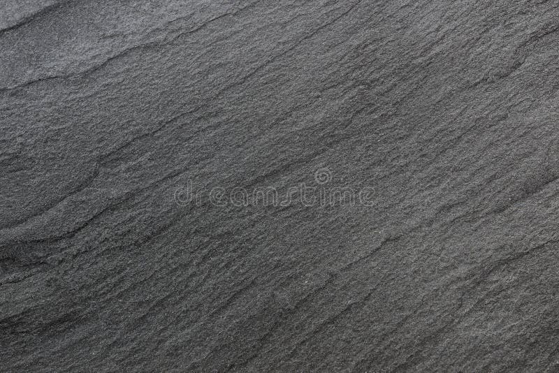 Donkere grijze zwarte leiachtergrond of textuur