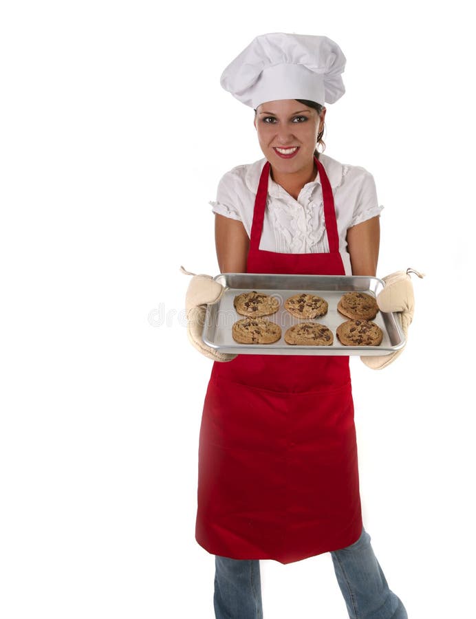 Donna in biscotti di cottura del grembiule