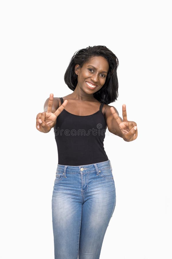 Woman making two peace signs with hands. Woman making two peace signs with hands