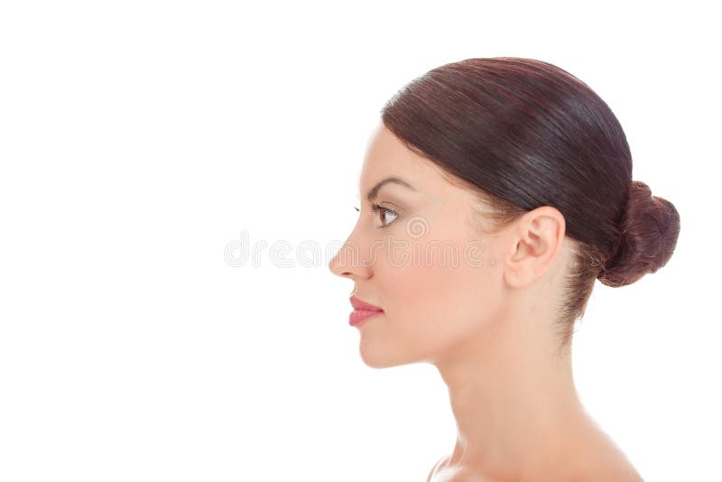 Donna che guarda per parteggiare nella vista di profilo che mostra a pelle pulita fronte fresco immagine stock libera da diritti Donna che guarda per parteggiare nella vista di profilo che mostra a pelle pulita fronte fresco immagine stock libera da diritti