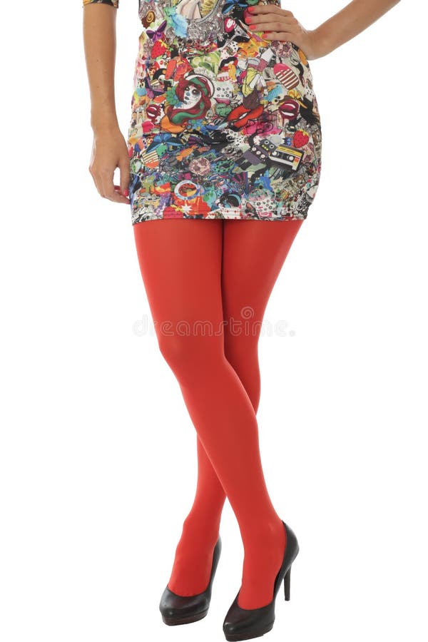 Donna che indossa breve Mini Dress con le calzamaglia rosse fotografie stock libere da diritti Donna che indossa breve Mini Dress con le calzamaglia rosse fotografie stock libere da diritti