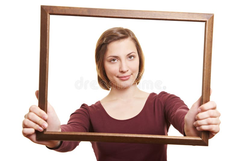 Donna che osserva attraverso il blocco per grafici vuoto fotografia stock libera da diritti Donna che osserva attraverso il blocco per grafici vuoto fotografia stock libera da diritti