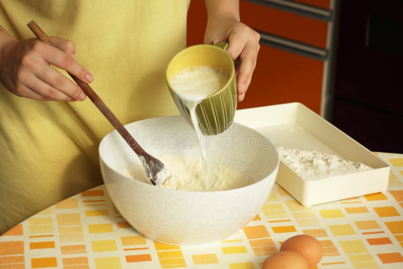 Picture of mixing dough for fresh pancakes. Picture of mixing dough for fresh pancakes