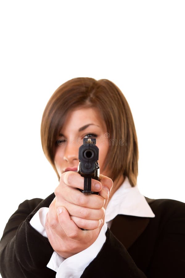 Donna che tiene una pistola fotografia stock Donna che tiene una pistola fotografia stock