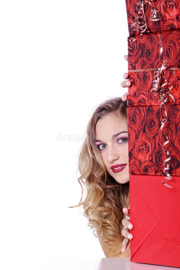 Donna con i regali di Natale immagine stock