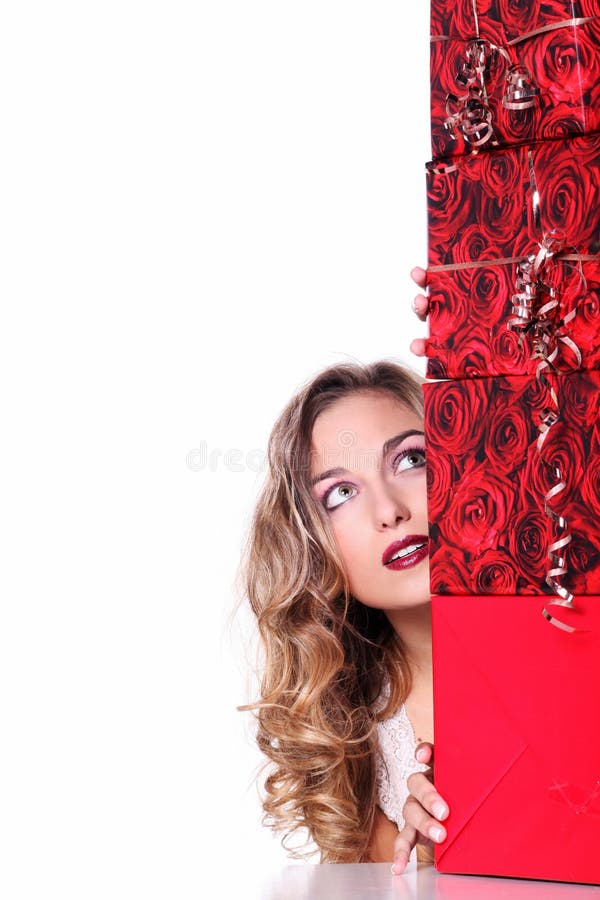 Donna con i regali di Natale fotografie stock