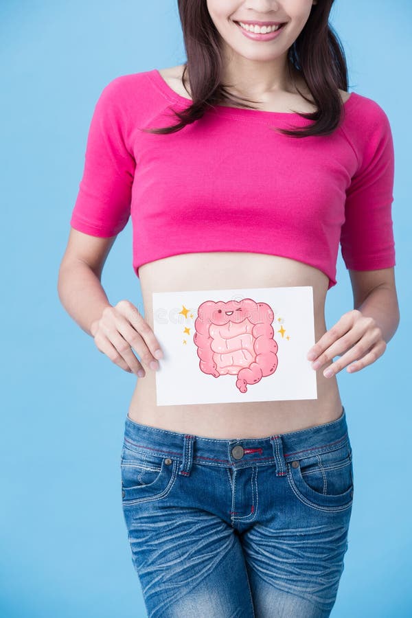 Woman with health intestine concept on the blue background. Woman with health intestine concept on the blue background