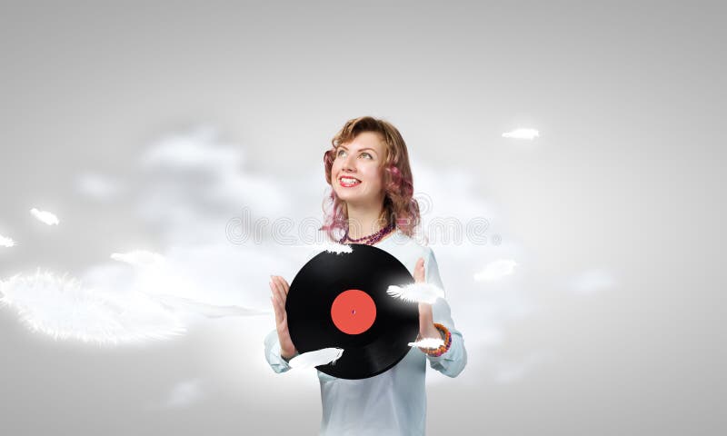 Donna con il piatto della discoteca immagine stock Donna con il piatto della discoteca immagine stock