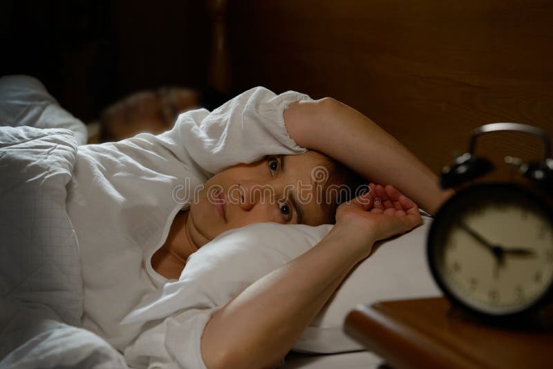 Donna con insonnia fotografia stock Donna con insonnia fotografia stock