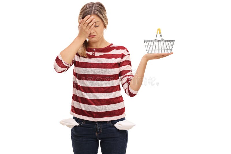 Donna con le tasche vuote che tengono la sua testa nell'incredulità immagine stock Donna con le tasche vuote che tengono la sua testa nell'incredulità immagine stock
