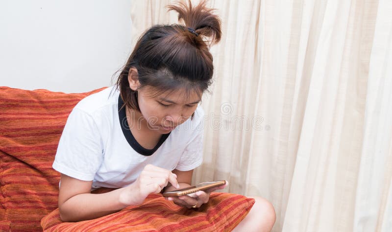 Woman with smartphone touching screen and using app. Woman with smartphone touching screen and using app.