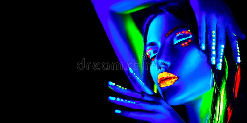 Fashion model woman in neon light, portrait of beautiful model girl with fluorescent makeup, Body art design in UV, painted face, colorful make up, over black background. Fashion model woman in neon light, portrait of beautiful model girl with fluorescent makeup, Body art design in UV, painted face, colorful make up, over black background