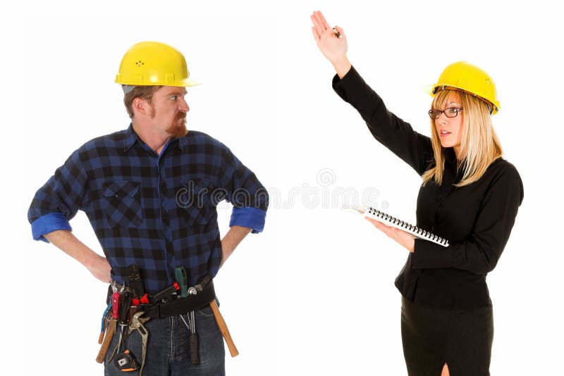 Donna di affari ed operaio di costruzione fotografia stock libera da diritti Donna di affari ed operaio di costruzione fotografia stock libera da diritti