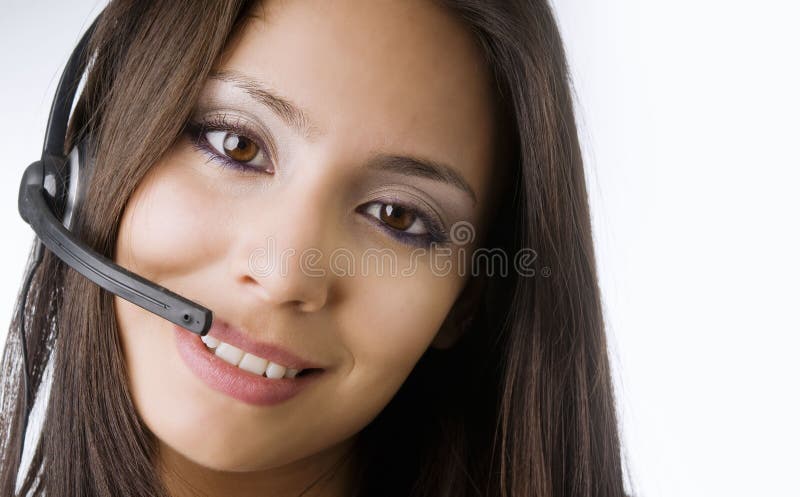 Donna di servizio di assistenza al cliente che comunica sul telefono immagini stock libere da diritti Donna di servizio di assistenza al cliente che comunica sul telefono immagini stock libere da diritti