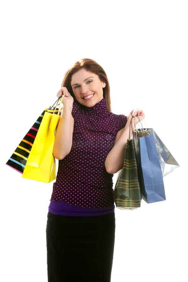 Donna di Shopaholic con i sacchetti variopinti sopra bianco