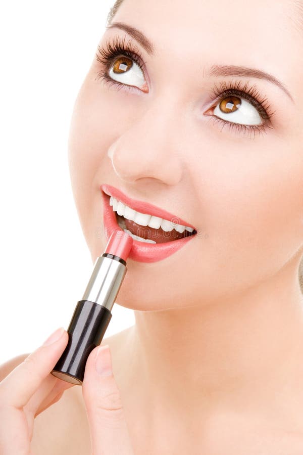 Donna graziosa con rossetto immagine stock libera da diritti Donna graziosa con rossetto immagine stock libera da diritti