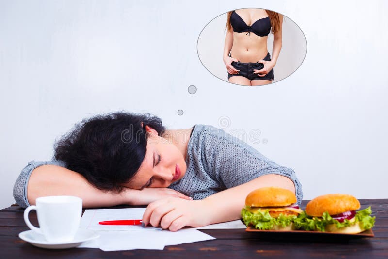 Overweight obese woman with junk food sleeping and dreaming of fit and slim body. Weight losing, obesity, high-calorie food, unhealthy nutrition,dieting concept. Overweight obese woman with junk food sleeping and dreaming of fit and slim body. Weight losing, obesity, high-calorie food, unhealthy nutrition,dieting concept