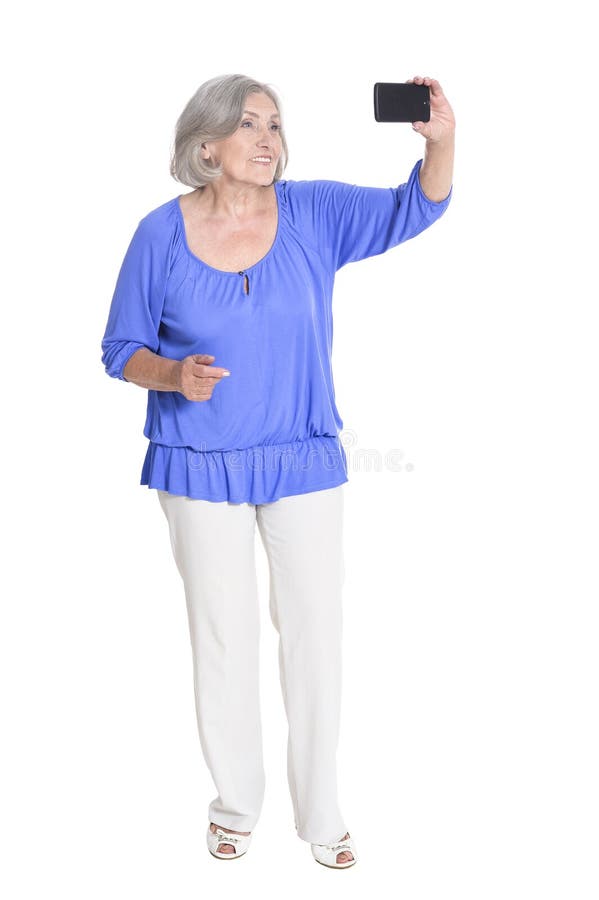 Donna senior felice che prende selfie immagine stock Donna senior felice che prende selfie immagine stock