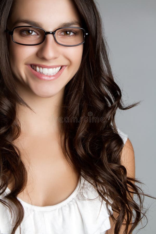 Donna sorridente di vetro immagini stock libere da diritti Donna sorridente di vetro immagini stock libere da diritti