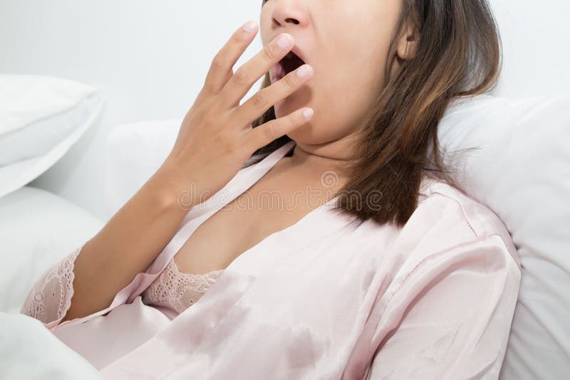 Yawning tired woman on white background, Sleepy, Concept with Healthcare And Medicine. Yawning tired woman on white background, Sleepy, Concept with Healthcare And Medicine.