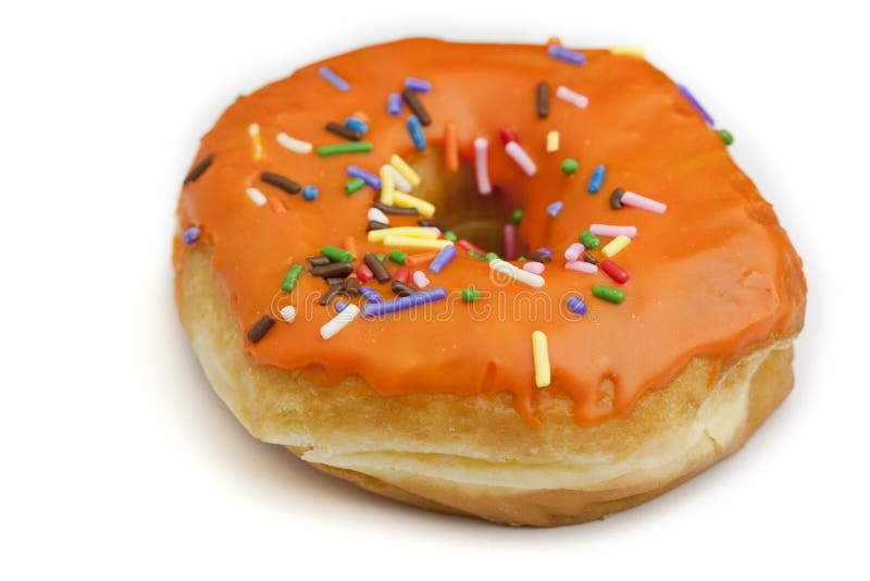 Donut With Orange Frosting And Rainbow Sprinkles Stock Image Image of