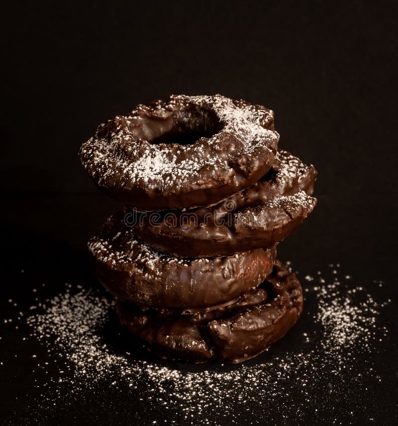 Chocolate Donut Tower Sprinkled with Powdered Sugar Stock Illustration