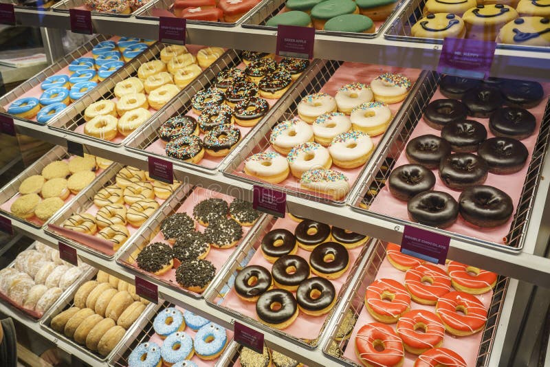 Very high resolution, 42.2 megapixels. Assortiment of donuts with various colors and toppings. Photo taken on: April 10, 2016.