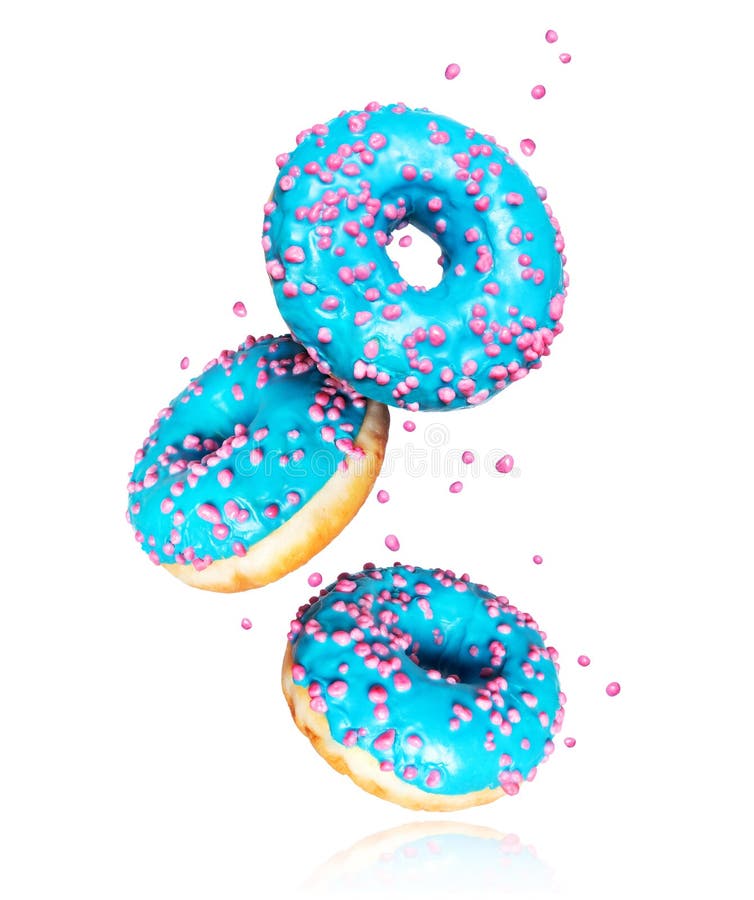 Donuts with blue glaze frozen in the air on a white background.