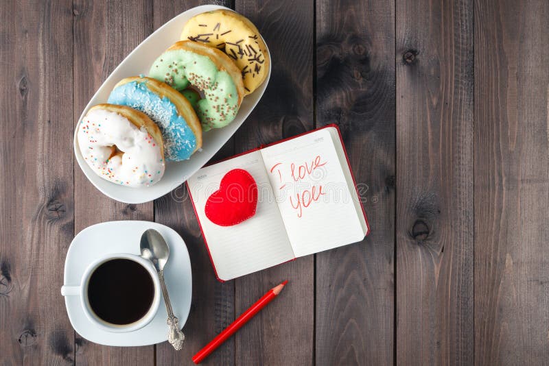 Donuts with coffee and message i love you stock photos Donuts with coffee and message i love you stock photos