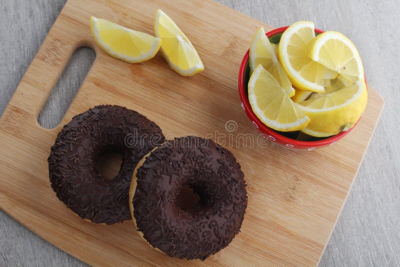 Chocolate Donuts with Lemon for Breakfast Stock Photo Image of