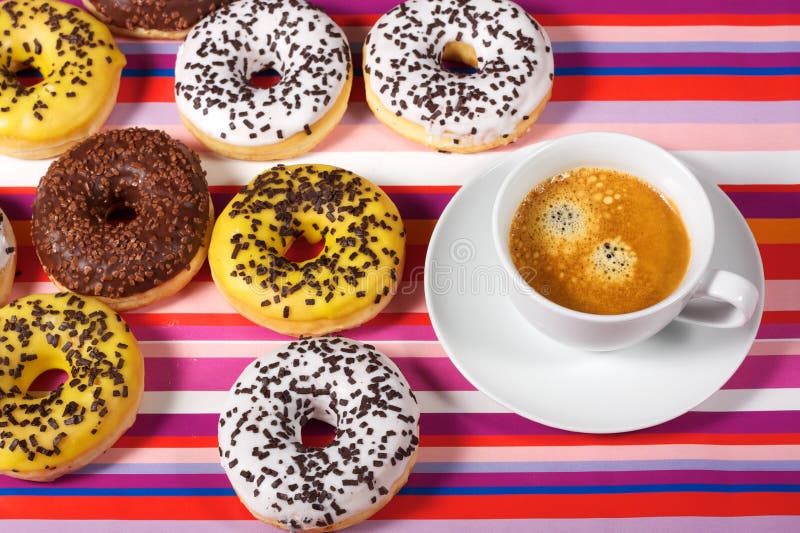 Donuts with cup of coffee