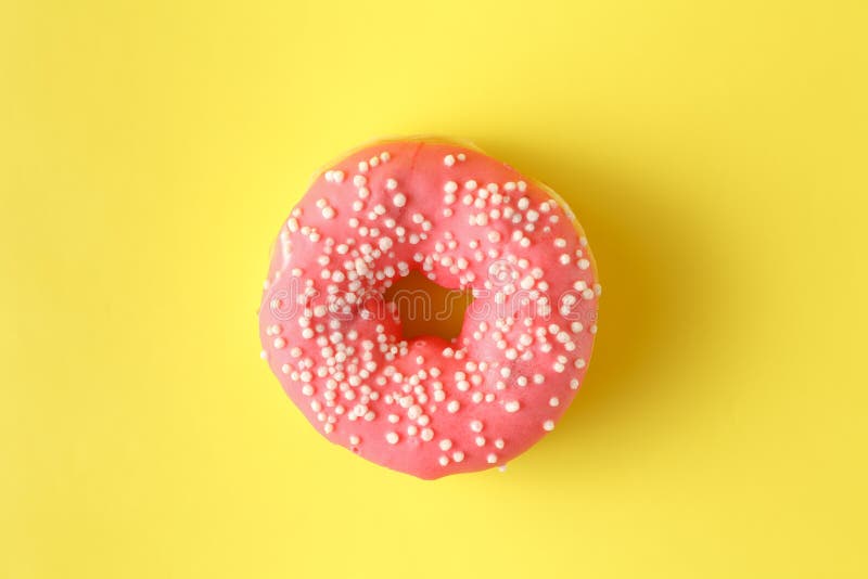 Donuts with Icing on Pastel Yellow Background. Sweet Donuts. Stock Photo Image of bakery