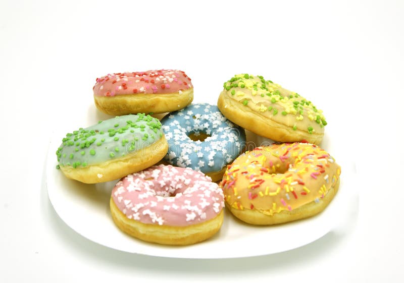 Donuts Различные donuts Куча сортированных donuts изолированных на белой предпосылке стоковые фото Donuts Различные donuts Куча сортированных donuts изолированных на белой предпосылке стоковые фото