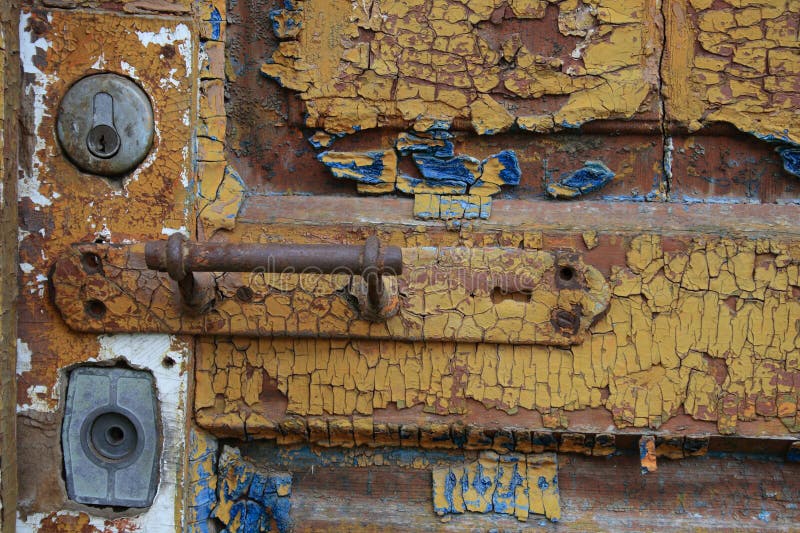 Door handle on old pain wood