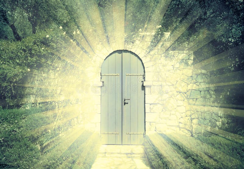 Door of the heaven in a dreamy rosegarden with sunbeam