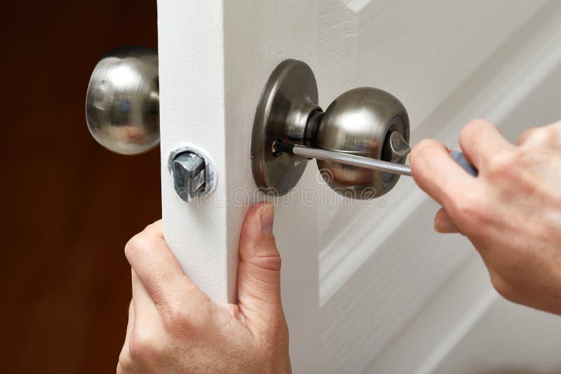 Door knob installation. stock image. Image of project 79258953