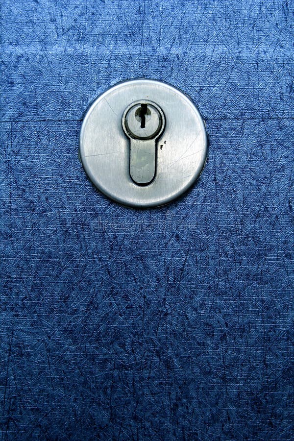Door lock and a blue door royalty free stock image