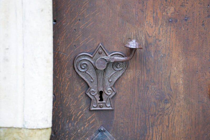Door Lock and Door Knocker on Old Doors Photographed in Daylight Stock