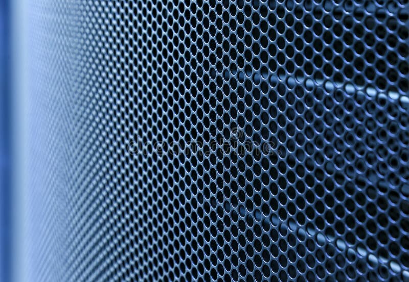 Door perforated of server rack cabinet. The key is inserted into door lock. Side lighting and shallow DOF stock photography
